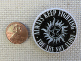 Second view of Always Keep Fighting Needle Minder.