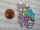 Second view of Brown Llama with a pair of cactus and a cute little snowman minder.