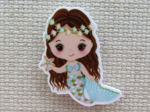 First view of Starfish Holding Mermaid Needle Minder.