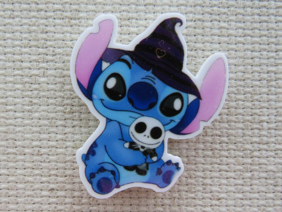 First view of Witch Stitch Holding a Jack Doll Needle Minder.