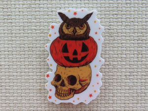 First view of Skull, Pumpkin and An Owl Needle Minder.