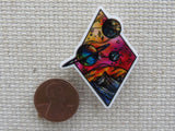 Second view of A Diamond of Planets Needle Minder.