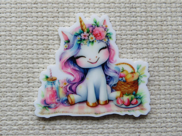 First view of a happy unicorn having a picnic minder.