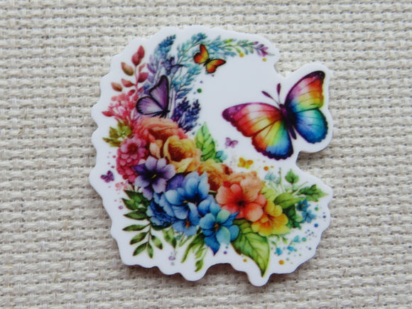 First view of  rainbow colored butterfly with a cascade of rainbow colored flowers minder.