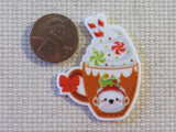 Second view of Elf Cocoa Needle Minder.