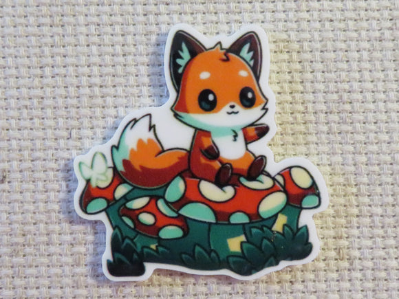 First view of Fox Sitting on Toadstools Needle Minder.