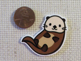 Second view of Playful Otter Needle Minder.