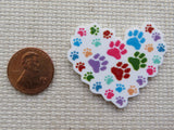 Second view of Colorful pawprints making up this gorgeous heart minder for all of the pet parents out there.