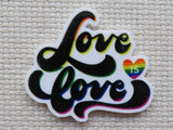 First view of The words "Love is Love" with a small rainbow heart minder.