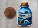 Second view of Vitamin Sea in a Bottle Needle Minder.