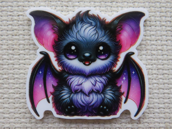 First view of Black and Purple Bat Needle Minder.