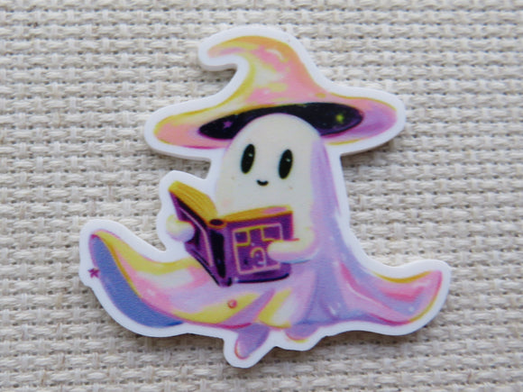 Cartoon ghost character with a witch hat reading a book minder.