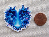 Second view of Blue Butterfly Waterfall Heart Needle Minder.