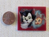 Second view of Figaro and Cleo Needle Minder.