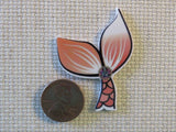 Second view of Golden Mermaid Tail Needle Minder.