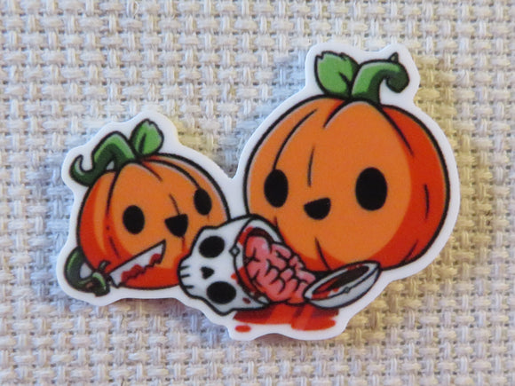 First view of Carved Pumpkins Carving a Skull Needle Minder.