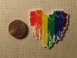 Second view of Dripping Rainbow Heart Needle Minder.