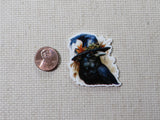 Third view of Crow with a Hat Needle Minder.