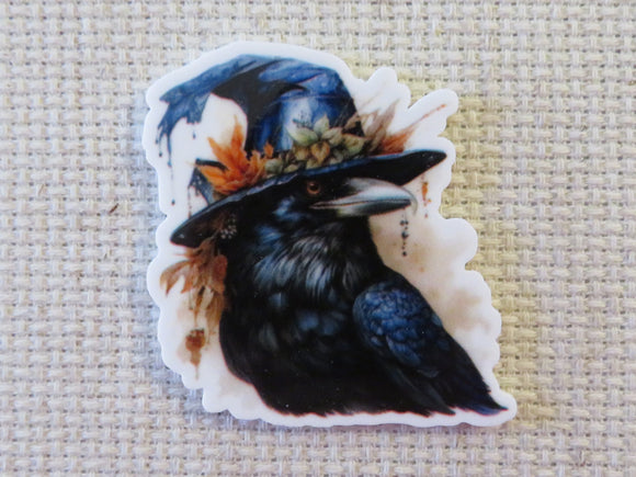 First view of a crow with a hat needle minder.