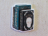 First view of Skull Spell Books Needle Minder.