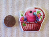 Second view of Pink Parakeet in a Basket Needle Minder.