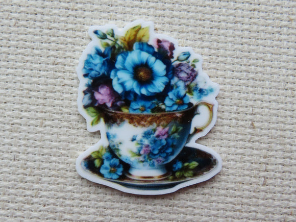 First view of Blue Floral Teacup Needle Minder.