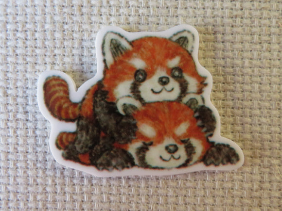 First view of A Pile of Red Pandas Needle Minder.