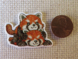 Second view of A Pile of Red Pandas Needle Minder.