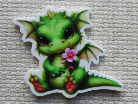 First view of Green Dragon with a Pink Flower Needle Minder.
