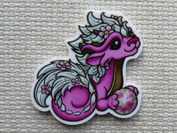 First view of Pink Orb Dragon Needle Minder.