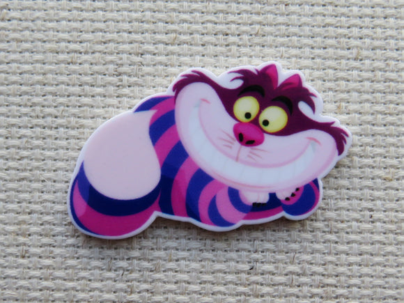 First view of grinning Cheshire cat minder.