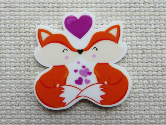 First view of Kissing Foxes Needle Minder.