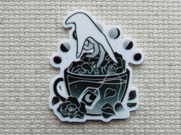 First view of Phases of the Moon Teacup Needle Minder.