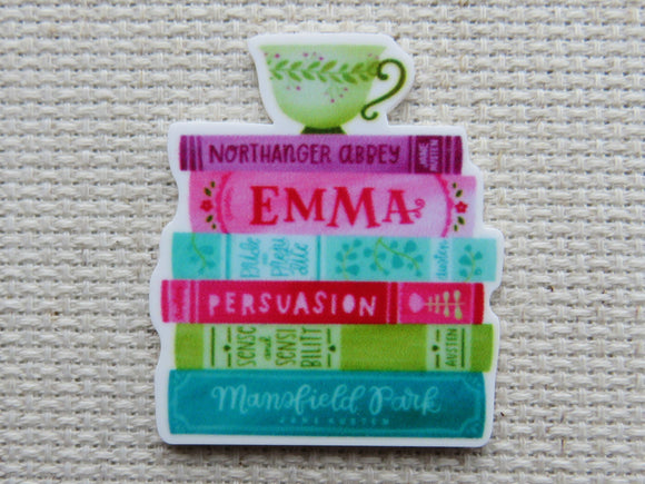 First view of A Stack of Books with A Green Teacup Needle Minder.
