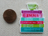 Second view of A Stack of Books with A Green Teacup Needle Minder.