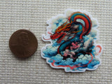 Second view of Red Dragon Resting on a Cloud Needle Minder.