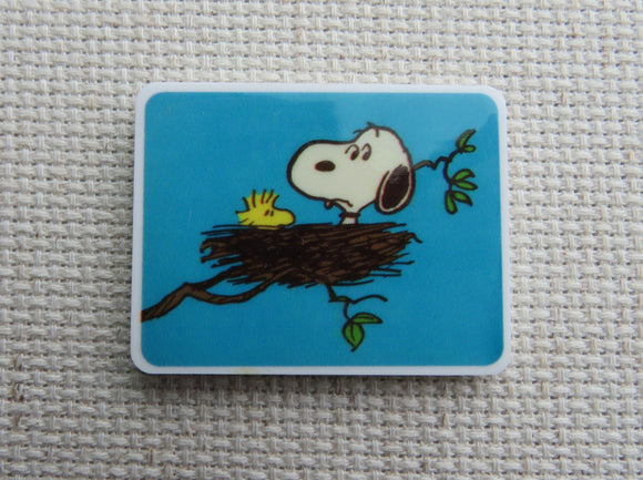 First view of Snoopy in Woodstock's Nest Needle Minder,.