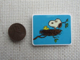 Second view of Snoopy in Woodstock's Nest Needle Minder.