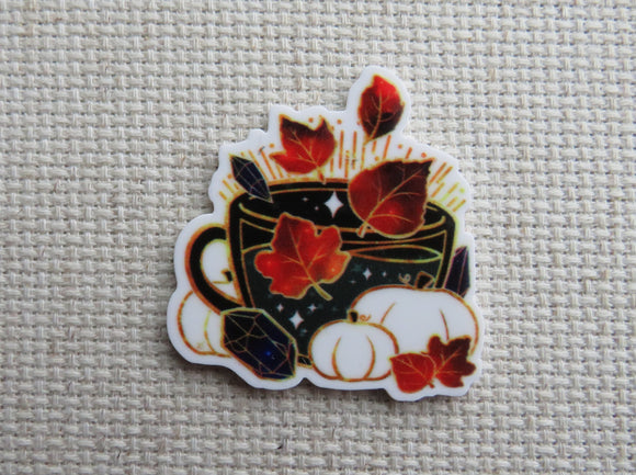 First view of Autumn Themed Teacup Needle Minder.