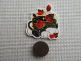 Second view of Autumn Themed Teacup Needle Minder.