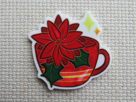 First view of Poinsettia Teacup Needle Minder.