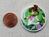 Second view of green anime circle needle minder.