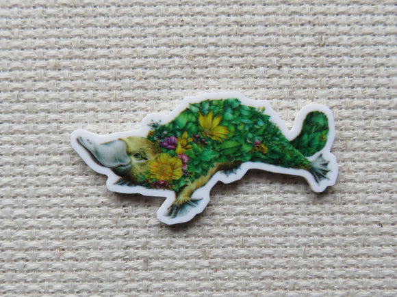 First view of Floral Covered Platypus Needle Minder.
