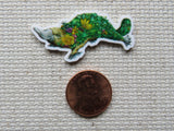 Second view of Floral Covered Platypus Needle Minder.