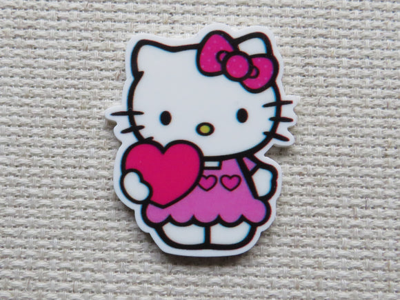 First view of Cute White Kitty Holding a Heart Needle Minder.