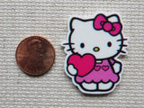 Second view of Cute White Kitty Holding a Heart Needle Minder.