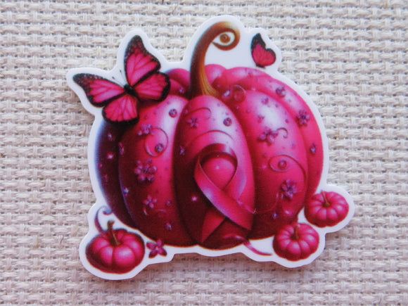 Decorative pink pumpkin minder with butterflies and flowers 