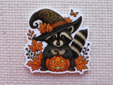Halloween-themed minder with a raccoon in a witch hat and pumpkin.