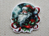 Decorative minder of Santa Claus with holly leaves and berries on a textured background