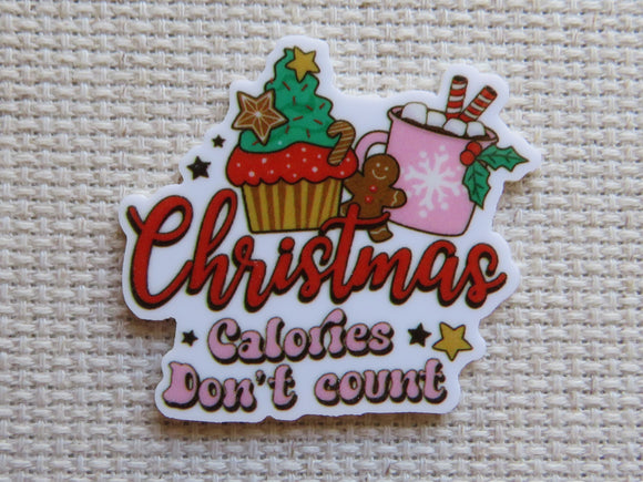 Minder with Christmas-themed design and text 'Christmas Calories Don't Count' on a textured background